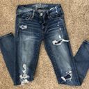 American Eagle Outfitters Ripped skinny jeans w patches Blue Size 0 Photo 1