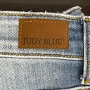 Judy Blue  paint slash distressed shorts in a size small Photo 4