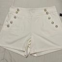 Absolutely Famous White Gold Buttoned Shorts Photo 0