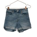 Levi's Levi’s high-rise rolled up shorts wedgie denim shorts. Size 28. Medium wash Photo 2