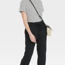 A New Day Women’s High-Rise Woven Ankle Jogger Pants - Photo 0