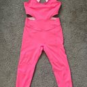 Free People Movement FP Movement “back it up” onesie in the dragonfruit color Photo 3