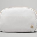 Lululemon  Everywhere Belt Bag Vapor Gold White Wordmark Logo Crossbody Bag NWT Photo 1