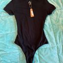 SKIMS Crewneck Short Sleeve Thong Bodysuit Photo 0