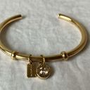 Coach: Gold Tone Charm Braclet- 2 charms- coach tag & rhinestone- open/slide on Photo 2