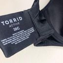 Torrid  Mid Impact Underwire Sports Bra Camo Print Size 38C Photo 3