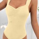 SheIn Soft Yellow Body Suit  Photo 1