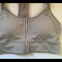 Athleta  ultimate sport bra women’s yoga gym grey sport bra size XS zipper front Photo 4