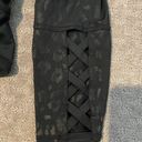 Bebe NWOT  Sport black animal print cropped leggings. Sz S Photo 3