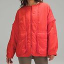 Lululemon  Insulated convertible jacket size L in solar orange Photo 0