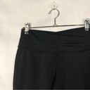 Lululemon  Astro Black Criss Cross Waistband Flared Leg Yoga Pant 6 Photo 10