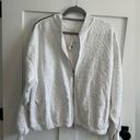 Free People Movement Fp movement by Free People white embroidered zip up jacket with black stripe Lg Photo 0