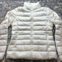 Uniqlo  women's cream light down puffer Photo 0