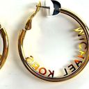 Michael Kors  | GOLD TONE MEDIUM SIZE LOGO HOOP EARRINGS Photo 6