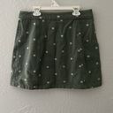 Miami Green denim silver button up daisy printed mini skirt Photo 2