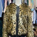 Uniqlo  By Carine Roitfeld faux fur bomber jacket, size large. Photo 4