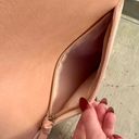 Hobo pink and tan shoulder bag with a unique asymmetrical design, featuring a side zipper closure Photo 2