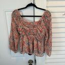 American Eagle pink multi floral smocked top size small Photo 0