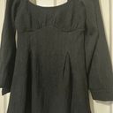 Free People NWOT  black mini dress. Photo 1