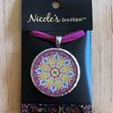 Necklace with sparkly mandala and evil eye design on pink ribbon Photo 0