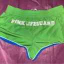 PINK - Victoria's Secret EUC-Love Pink Green running shorts with pockets and inside lining. Photo 4