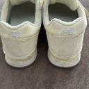 New Balance  classic style running shoes. Barely worn. Color- yellow. Size 7 Photo 6