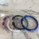 Macy's Four colorful metal painted twist bracelet. Photo 1