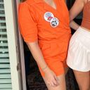 The Moon Day And Orange Gameday Romper  Photo 0