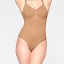 SKIMS  Seamless Sculpt Brief Bodysuit in Ochre Size 2X Photo 0