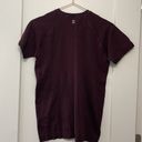 Sweaty Betty  athletic seem less workout short sleeve maroon t shirt. Size large Photo 4