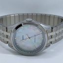 Timex ladies MOP dial Quartz analog watch 29mm silver tone case band 7” runs Photo 0