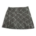 IZOD  XFG Black, White and Baby Blue Plaid Pleated Athletic Skorts‎ Photo 0