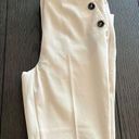 H &M Dress pants. In good condition. Minor flaws noted. Size 4 . Color : Ivory. Photo 0