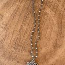 Brighton  Silver Toned Flower Reversible Pendant on a Brown Braided Cord. EUC! Photo 1