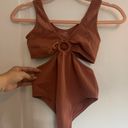 One Piece NWOT Sugar Rain  body suit. size S/M. never Worn before Photo 0