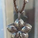 Brighton  Silver Toned Flower Reversible Pendant on a Brown Braided Cord. EUC! Photo 3