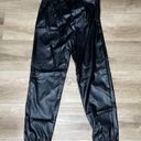 AQUA  Women's Black Faux Leather Elastic Waist/Ankle Pull On Jogger Pants sz S Photo 1