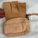 Anthropologie  Leifsdottir Peachy Pink Leather Magnetic Snake Print Wristlet Photo 4