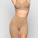 SKIMS  Butt Enhancing Short Shapewear in Ochre Size Small Photo 0