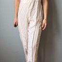 Free People Movement  One Piece Split Rock Jumpsuit in Ivory Size Small Photo 1