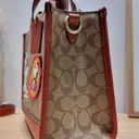 Coach  X Peanuts Dempsey Tote 22 In Signature Canvas With Patches CE851 Photo 3