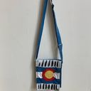 Colorado Flag Themed small to medium sized shoulder bag by Rising International. Photo 1