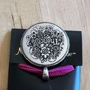 Necklace with sparkly mandala and evil eye design on pink ribbon Photo 1