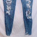 American Eagle  Next Level Stretch Distressed Mid Rise Curvy Jegging Jean size 0 Photo 3