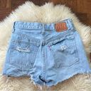 Levi’s  501 high rise big E light wash distressed jean shorts Photo 5