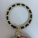 AWESOME GOLD AND BLACK ROUND PURSE WITH G&B WRISTELT HANDLE Photo 2