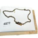  gold toned chain necklace with “guess” plated name plate Photo 4