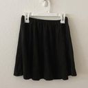 Brandy Melville greenish black flowy skirt Photo 1