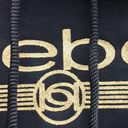 Bebe NWT  Black and Gold Glitter Logo Long Sleeve Pullover Hoodie Size Small Photo 2