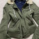 American Eagle Baby Doll Bomber Jacket sz Large  Olive colored with removable grey hoodie Photo 1